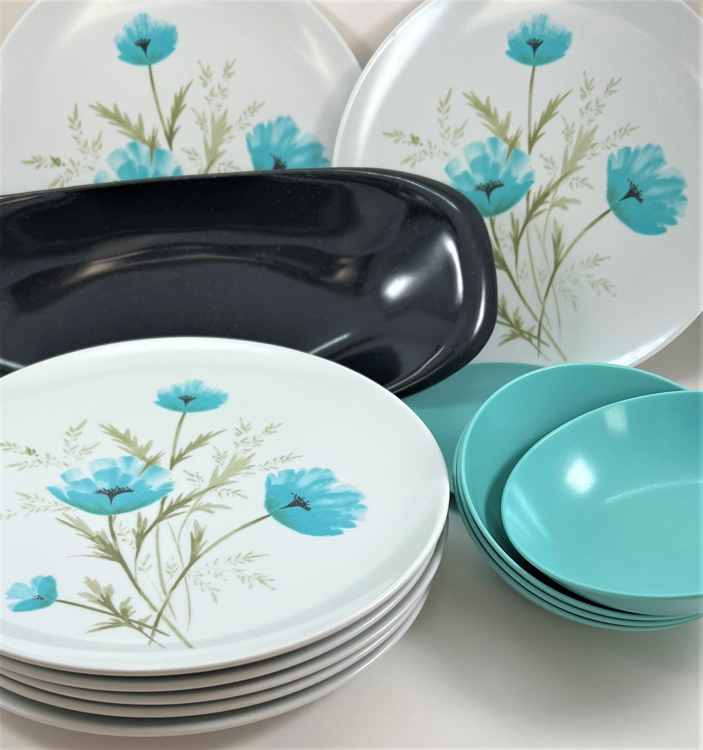 Mid-century Melamine Turquoise Poppies Dinnerware with Serving Pieces. c. 1965